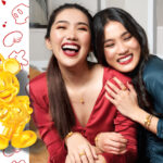 Two young women wearing disney jewellery made in gold